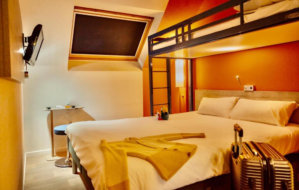Postel nebo postele na pokoji v ubytování ibis Budget Colmar Centre Gare
