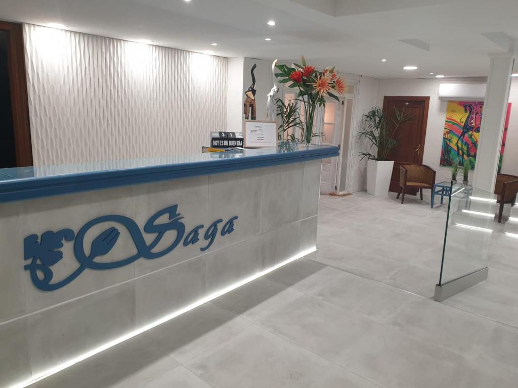 a bar in a hospital lobby with a pharmacy at Complejo Hotelero Saga in Manzanares