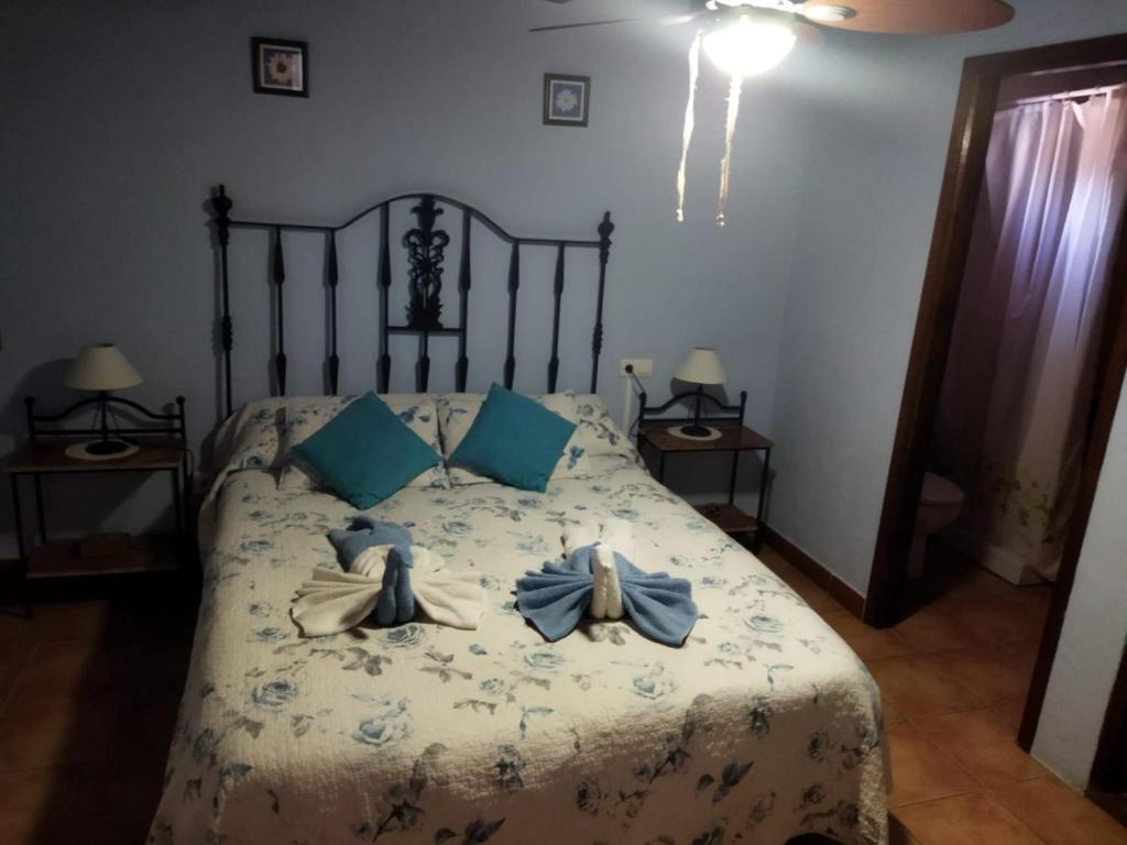Postel nebo postele na pokoji v ubytování Caseta de Susana