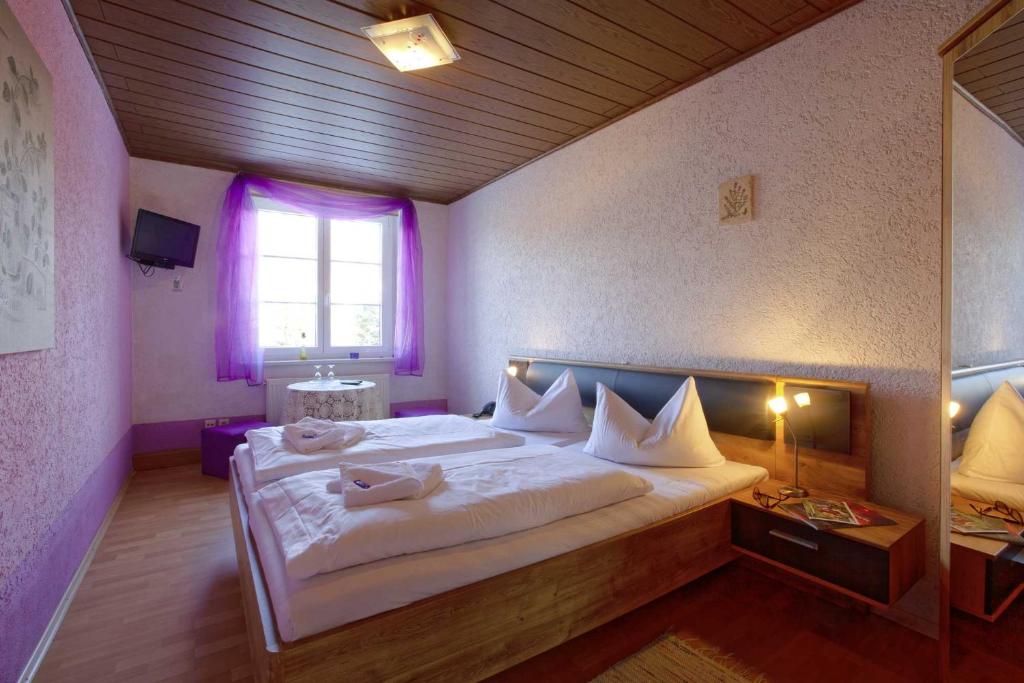 Postel nebo postele na pokoji v ubytování Kräuterbaude