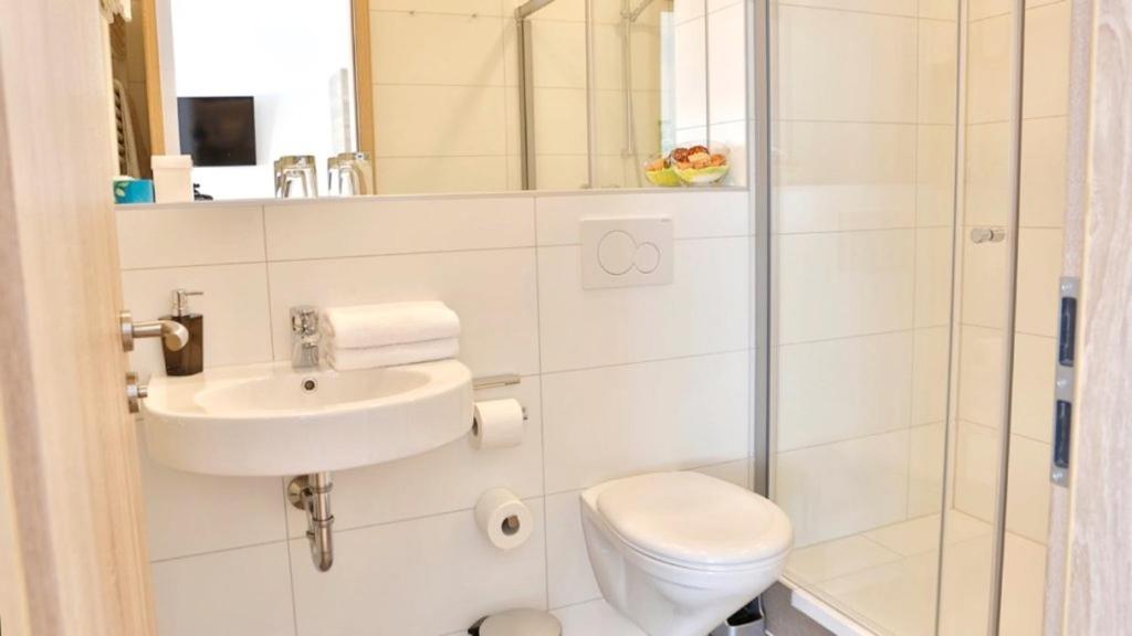 Koupelna v ubytování Das Falk Apartmenthaus