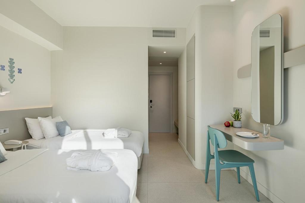 Voodi või voodid majutusasutuse Arkadi Hotel toas