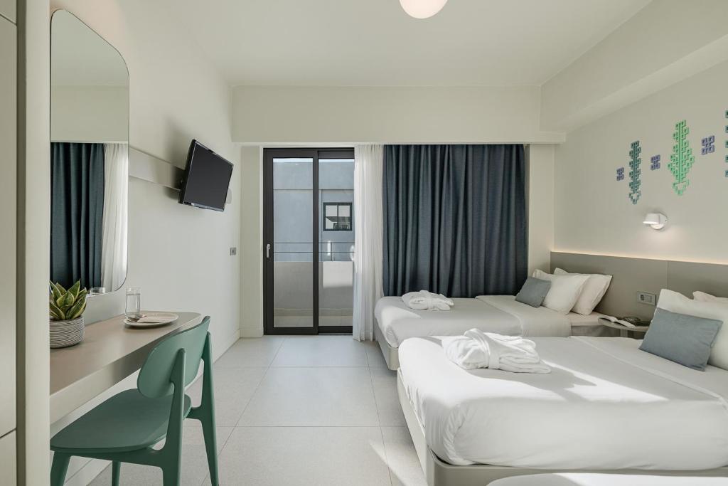 Voodi või voodid majutusasutuse Arkadi Hotel toas