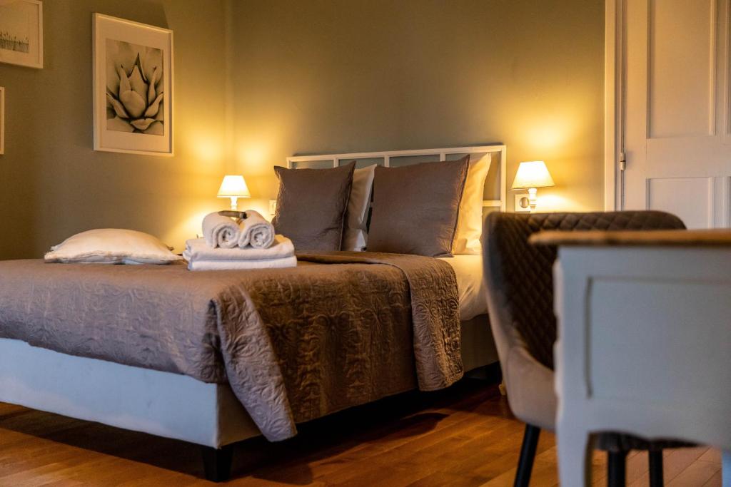 Postel nebo postele na pokoji v ubytování Hotel Ô Château