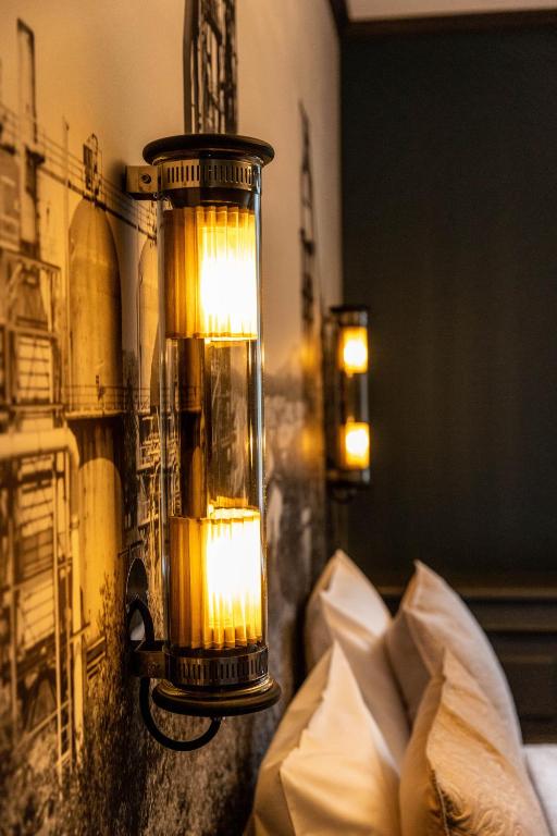 Postel nebo postele na pokoji v ubytování Hotel Ô Château