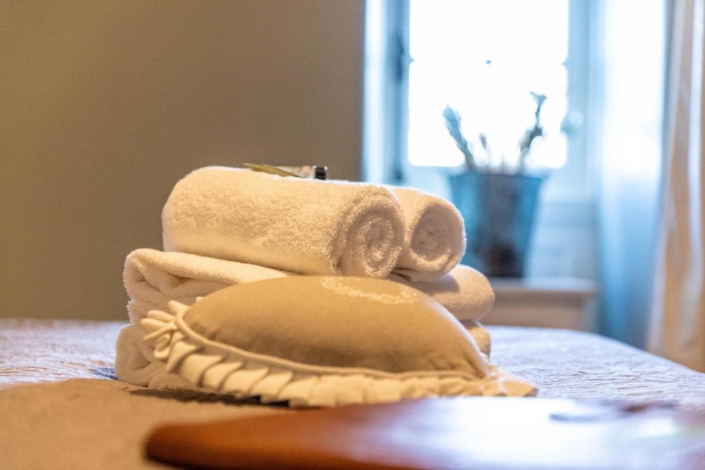 Postel nebo postele na pokoji v ubytování Hotel Ô Château