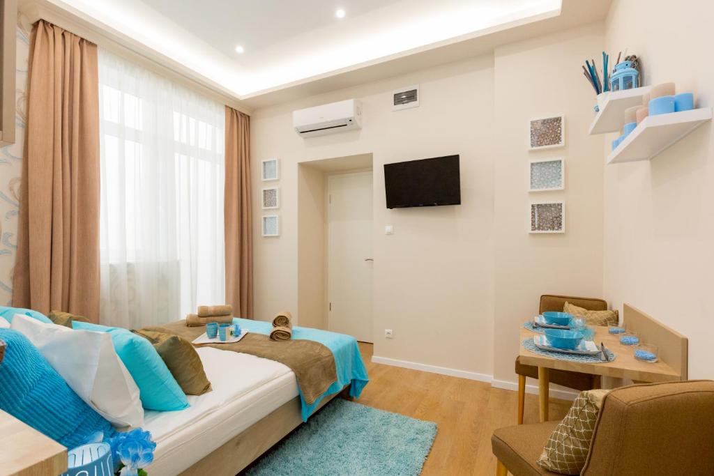 TV a/nebo společenská místnost v ubytování Budapest Holidays Harmony