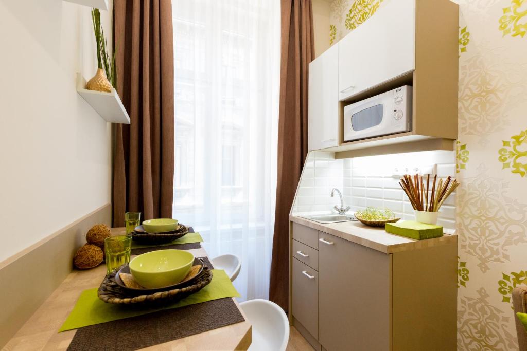 Kuchyň nebo kuchyňský kout v ubytování Budapest Holidays Harmony
