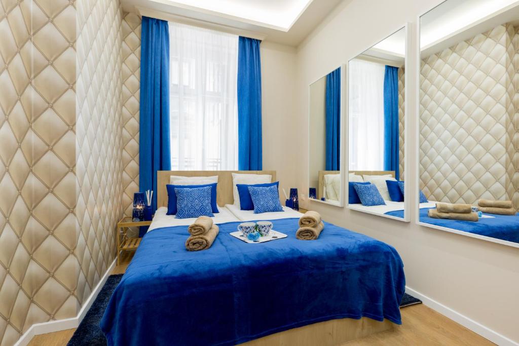 Postel nebo postele na pokoji v ubytování Budapest Holidays Harmony