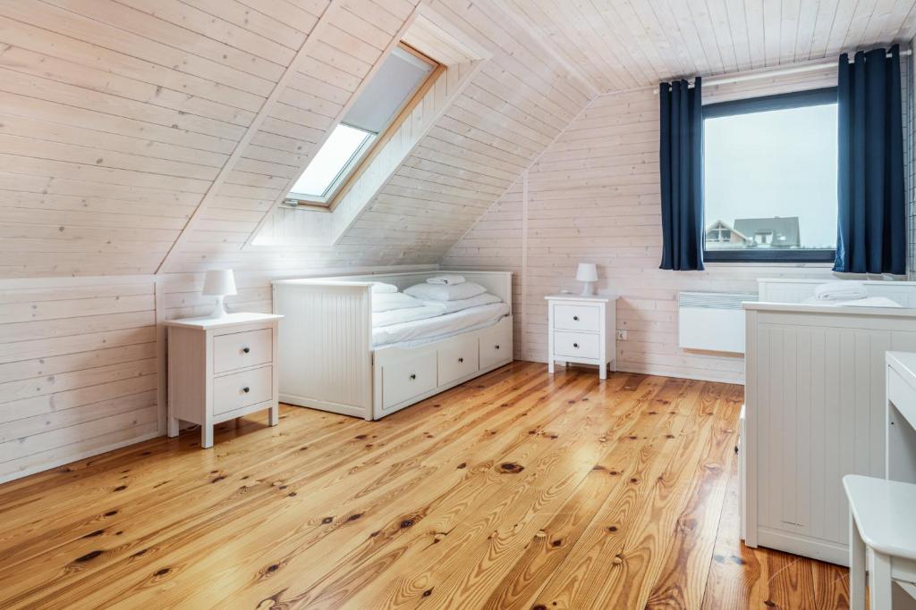 Posteľ alebo postele v izbe v ubytovaní Holiday House Cornello by Noclegi Renters