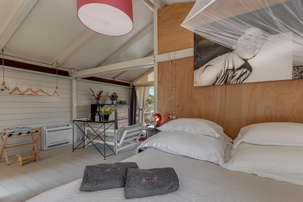 Postel nebo postele na pokoji v ubytování Be Vedetta - Relais & Glamping - Adult Only