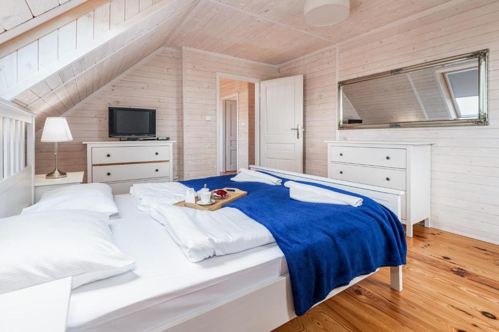 Posteľ alebo postele v izbe v ubytovaní Holiday House Cornello by Noclegi Renters