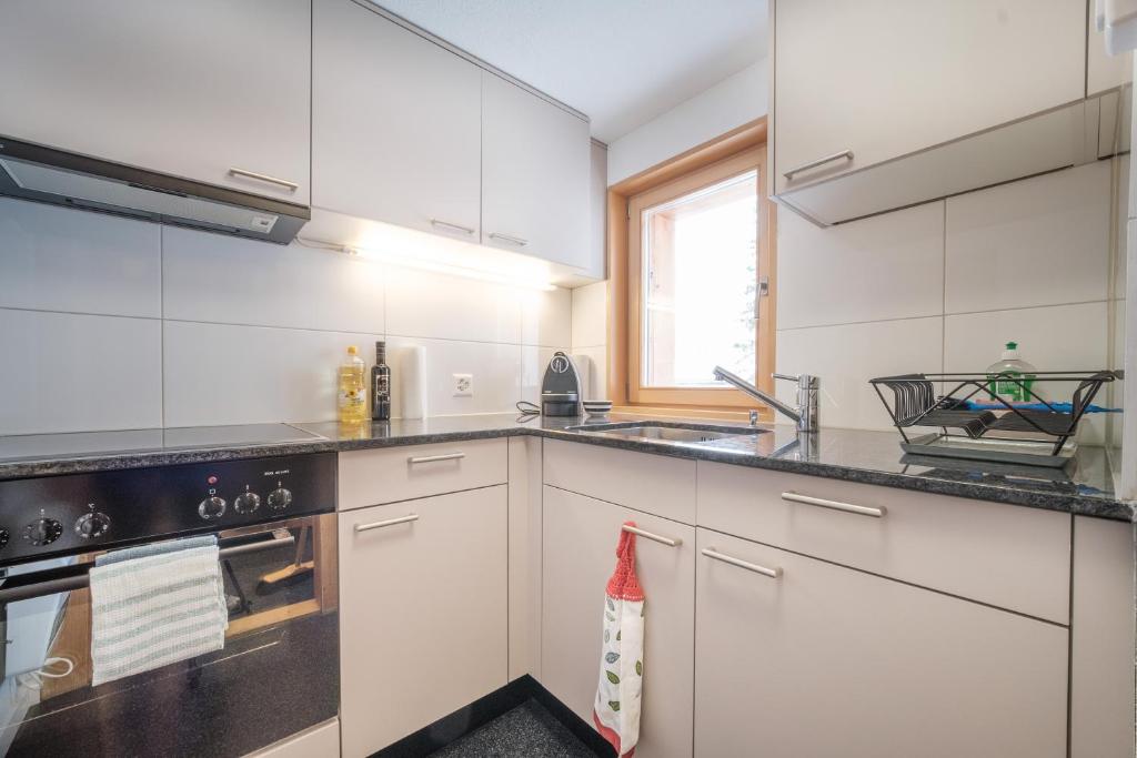 Kuchyň nebo kuchyňský kout v ubytování Chalet Höckli Wohnung 2.