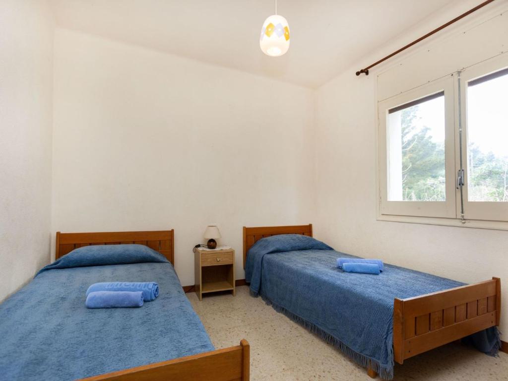 Posteľ alebo postele v izbe v ubytovaní Apartment Sarnella by Interhome