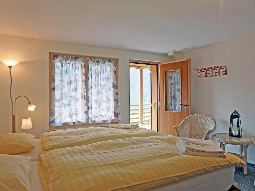 Postel nebo postele na pokoji v ubytování Apartment Racer's Retreat Apt-12 by Interhome