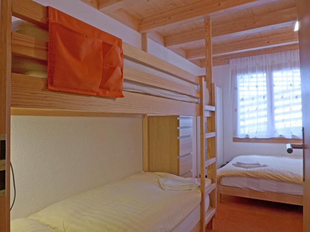 Postel nebo postele na pokoji v ubytování Apartment Racer's Retreat Apt-12 by Interhome