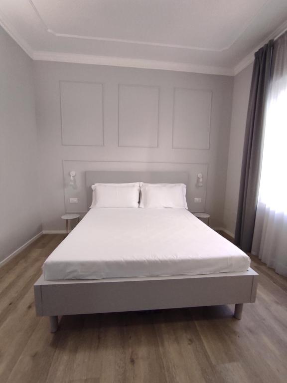 Postel nebo postele na pokoji v ubytování Residenza Montebello