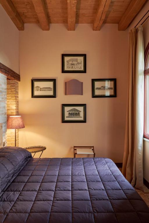Postel nebo postele na pokoji v ubytování Castello di Roncade