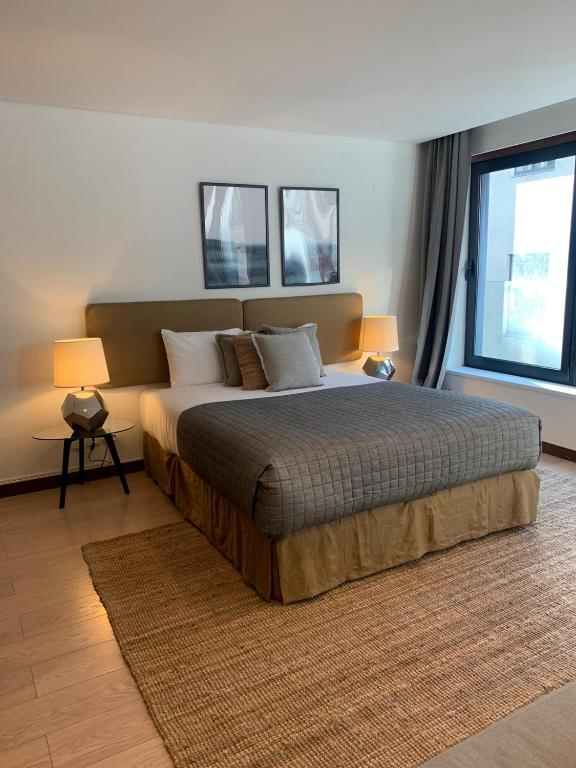 Postel nebo postele na pokoji v ubytování Oporto Chic & Cozy - Oliveiras