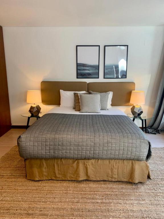 Postel nebo postele na pokoji v ubytování Oporto Chic & Cozy - Oliveiras