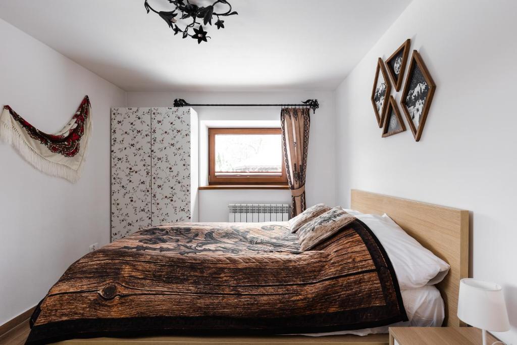 Posteľ alebo postele v izbe v ubytovaní Apartamenty Na Wilcznik Zakopane