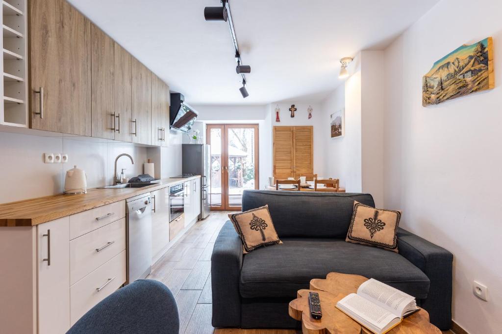 Kuchyňa alebo kuchynka v ubytovaní Apartamenty Na Wilcznik Zakopane