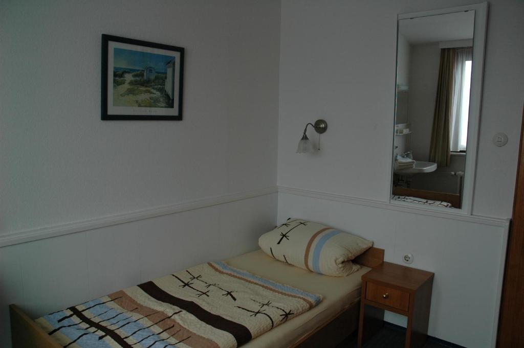 Postel nebo postele na pokoji v ubytování Pension Haus Weierts