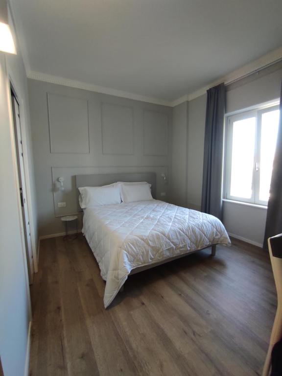 Postel nebo postele na pokoji v ubytování Residenza Montebello