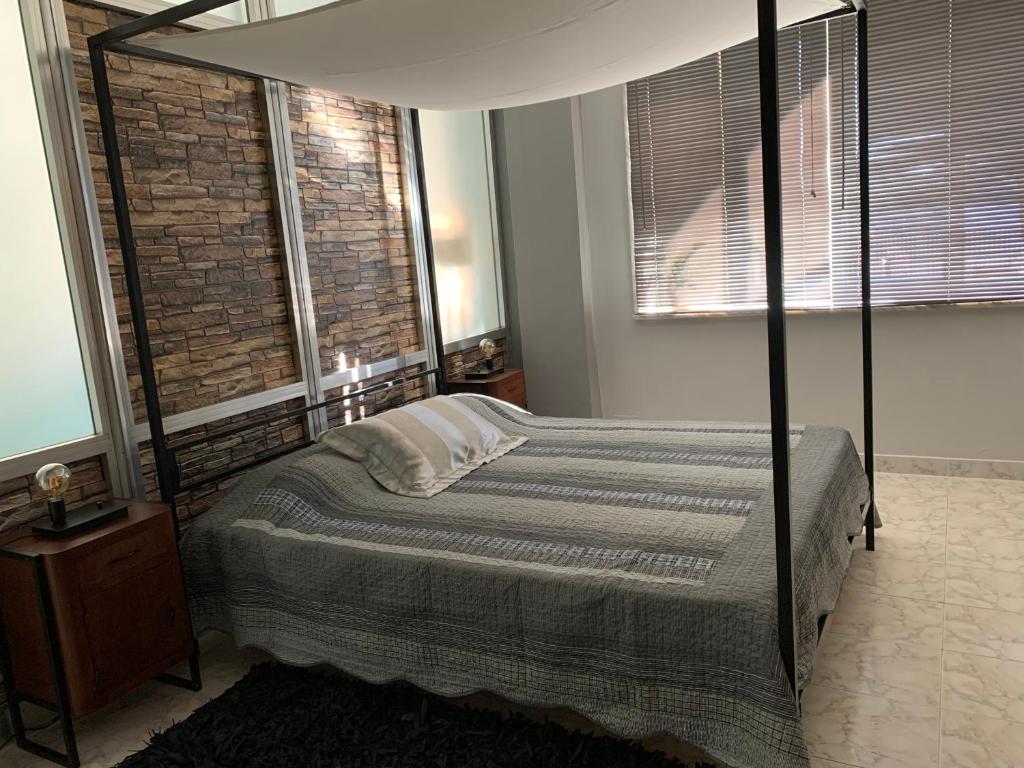 Posteľ alebo postele v izbe v ubytovaní "L' Industrial Green" Apartment