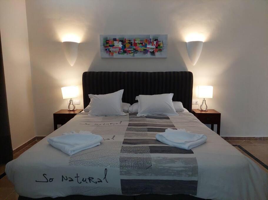 Postel nebo postele na pokoji v ubytování Hipoclub Villas, Aguamarina 27