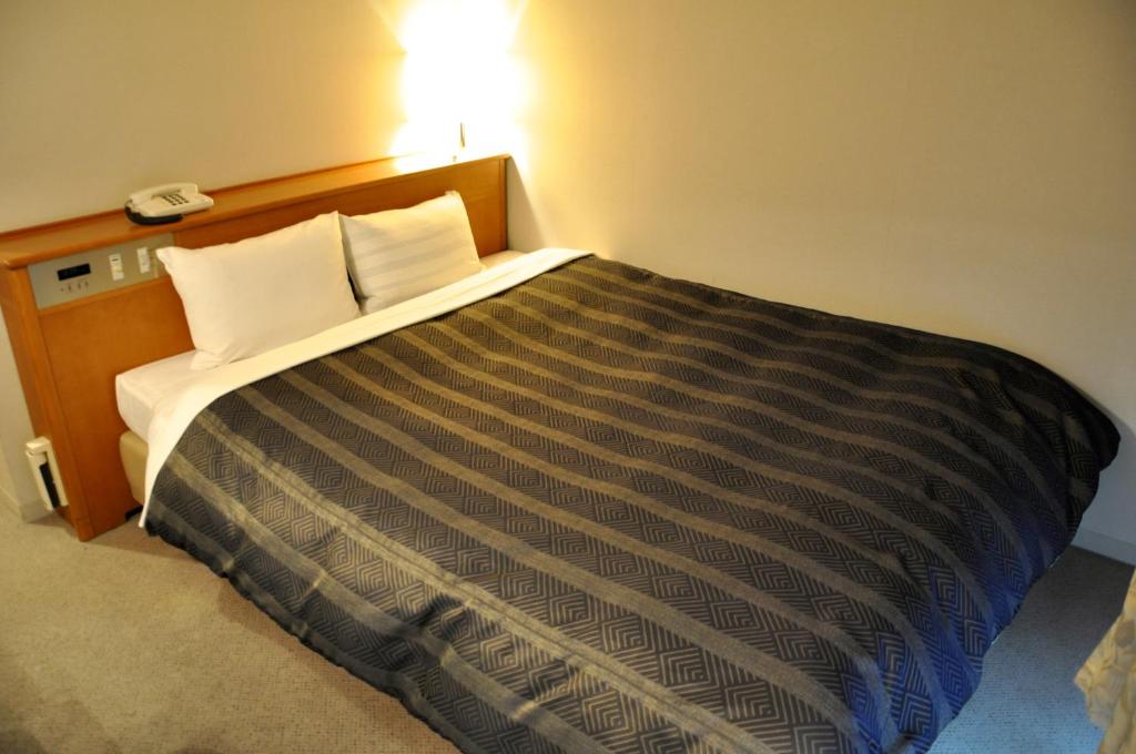 Postel nebo postele na pokoji v ubytování Hotel Bientos
