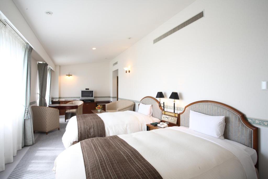 Postel nebo postele na pokoji v ubytování Hotel Bientos
