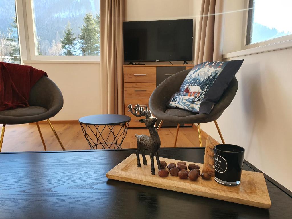 Telewizja i/lub zestaw kina domowego w obiekcie Ferienwohnung Kurz