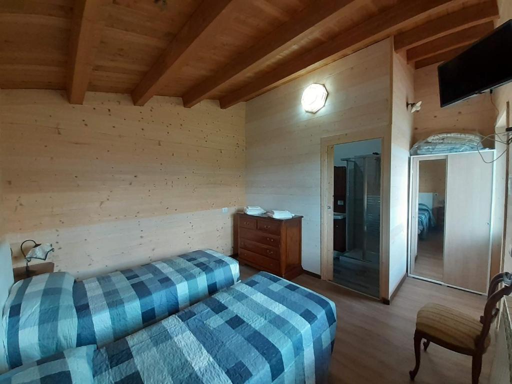 Posteľ alebo postele v izbe v ubytovaní Agriturismo D'Apostolo