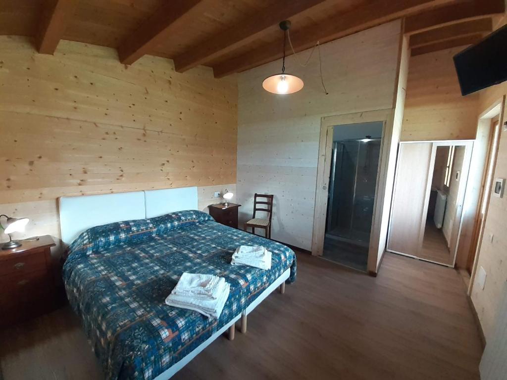 Posteľ alebo postele v izbe v ubytovaní Agriturismo D'Apostolo