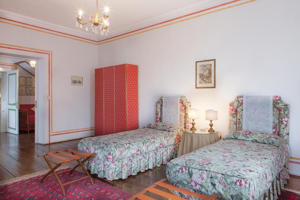 Postel nebo postele na pokoji v ubytování Castello di Roncade