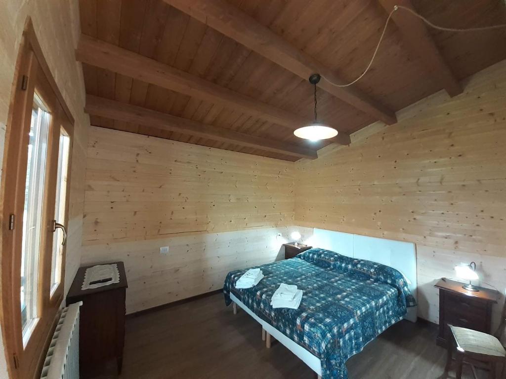 Posteľ alebo postele v izbe v ubytovaní Agriturismo D'Apostolo