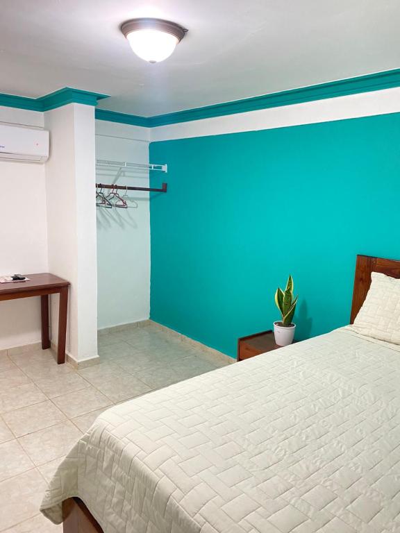 Letto o letti in una camera di LUTIX HOTELS
