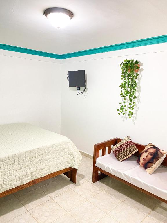 Letto o letti in una camera di LUTIX HOTELS