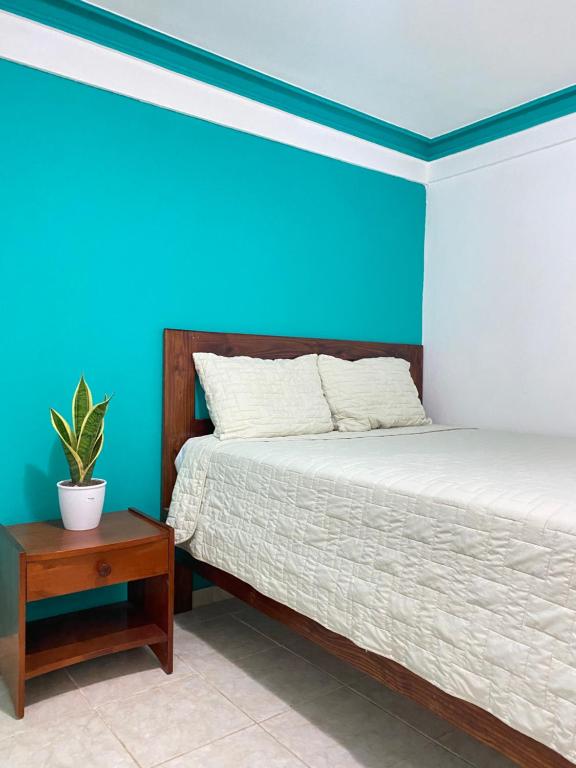 Letto o letti in una camera di LUTIX HOTELS