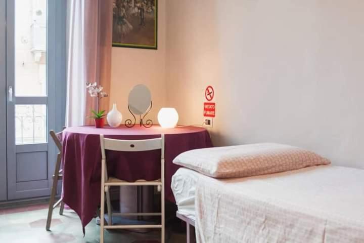 Postel nebo postele na pokoji v ubytování Casa Dani&Swing Bed&Books