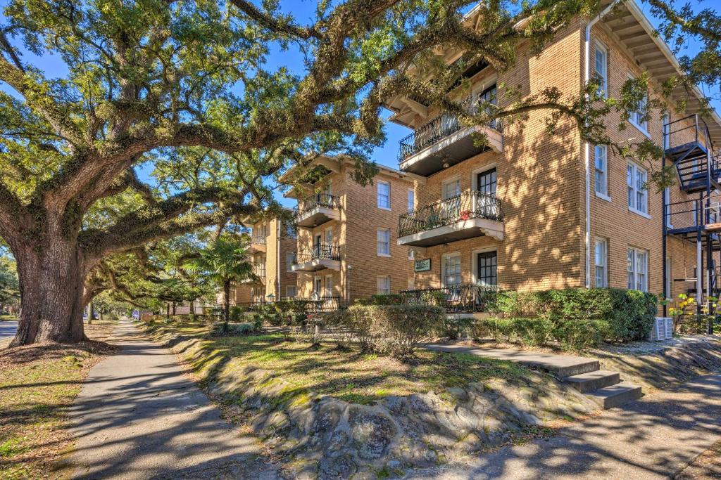 an apartment building with a tree in front of it at Stunning Alabama Studio about 2 Mi to Dtwn Mobile! in Mobile