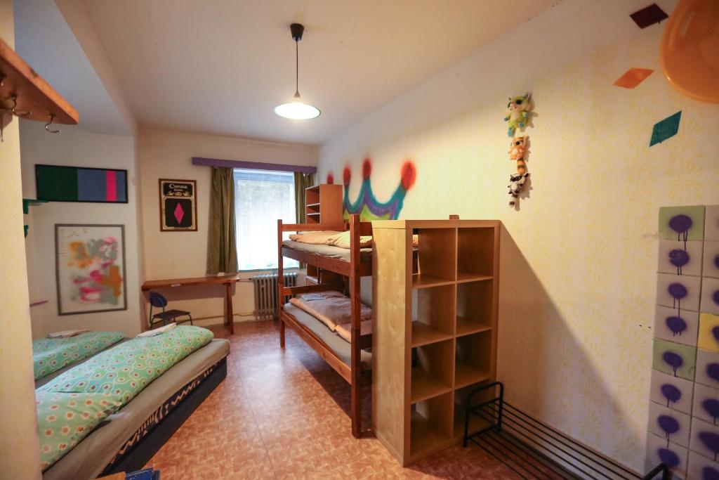 Postel nebo postele na pokoji v ubytování Hostel KlonDike