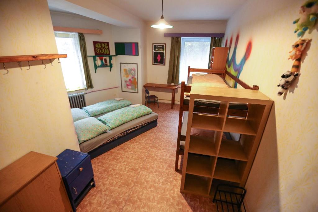 Postel nebo postele na pokoji v ubytování Hostel KlonDike