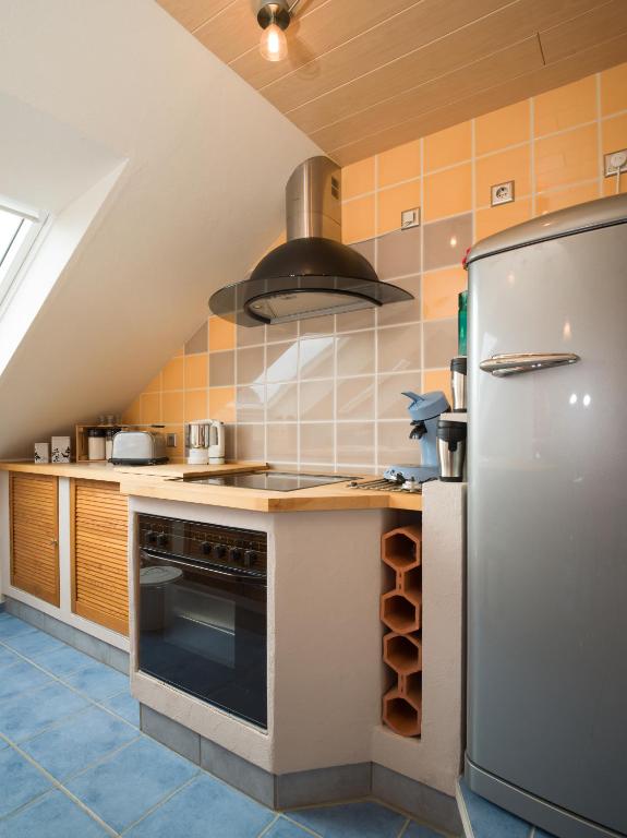 Kuchyň nebo kuchyňský kout v ubytování Ferienwohnung Maxima