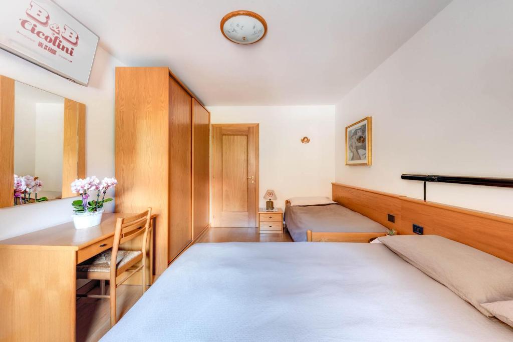Postel nebo postele na pokoji v ubytování B&B Cicolini