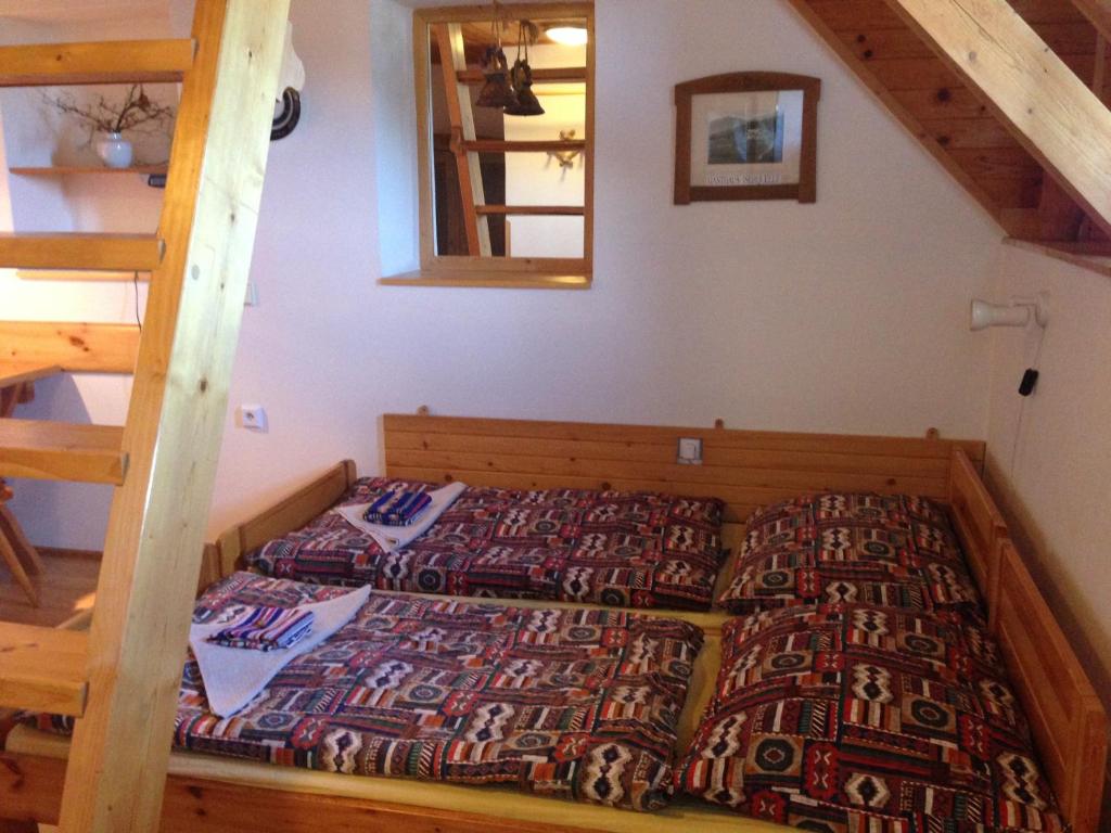 Postel nebo postele na pokoji v ubytování Yveta - Depandance Horské Zátiší