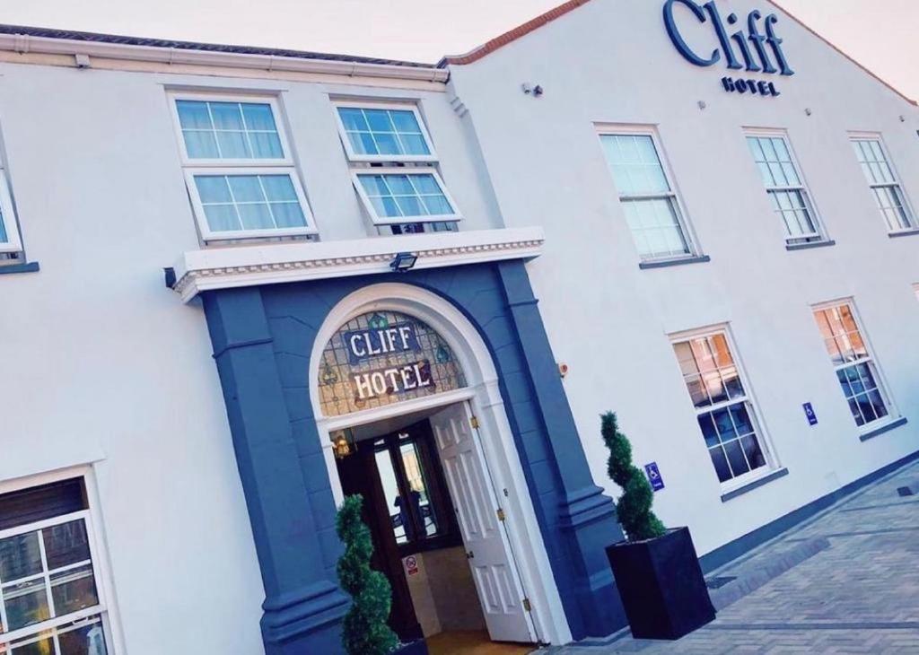 a building with the front door of a chef chef hotel at Cliff Hotel in Great Yarmouth