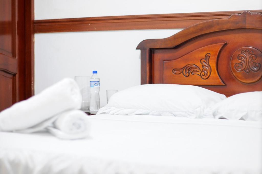 Postel nebo postele na pokoji v ubytování Hotel Rumbo al Sol