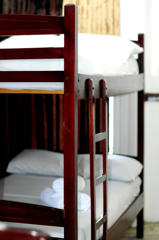 Postel nebo postele na pokoji v ubytování Hotel Rumbo al Sol